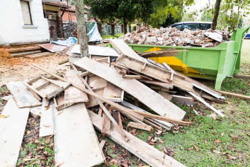 Professionals clearing out furniture in a Kentishtown home